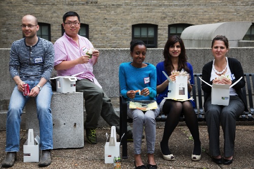 Time for lunch! McQuibban lab members enjoy the fine weather outside the auditorium